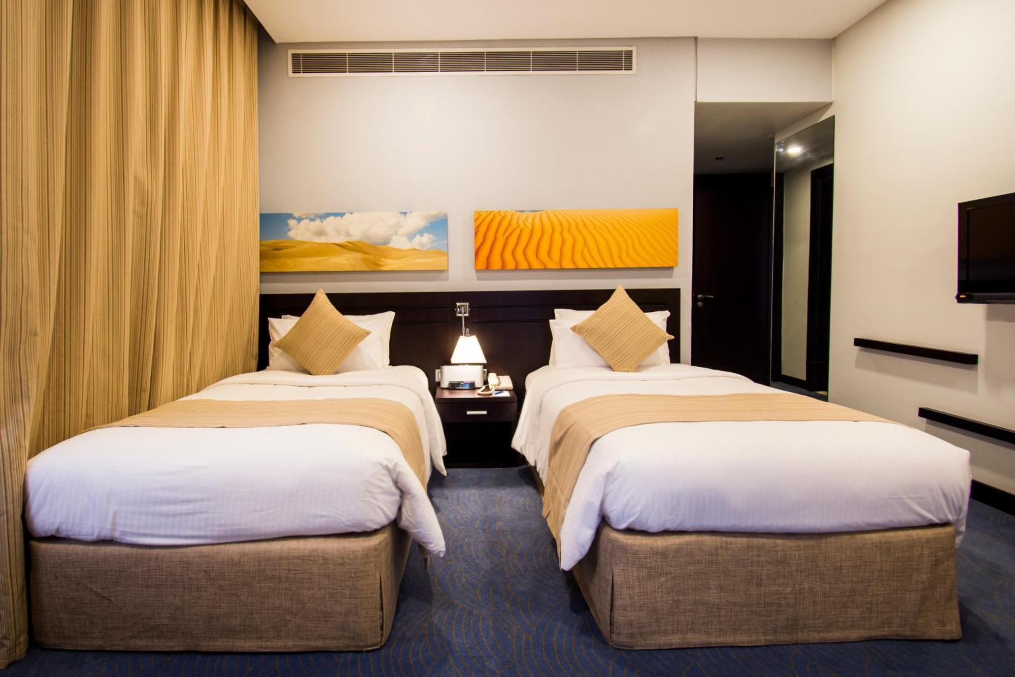 City Seasons Hotel & Suites Muscat Bilik gambar